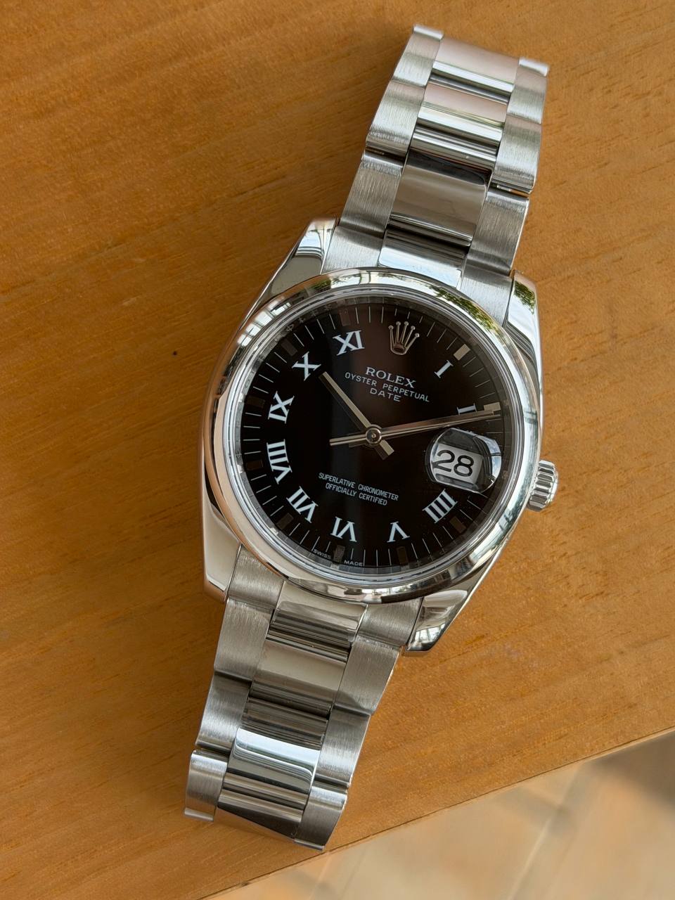 Rolex Oyster Perpetual Date Black Romain Dial 34mm G Series 115200